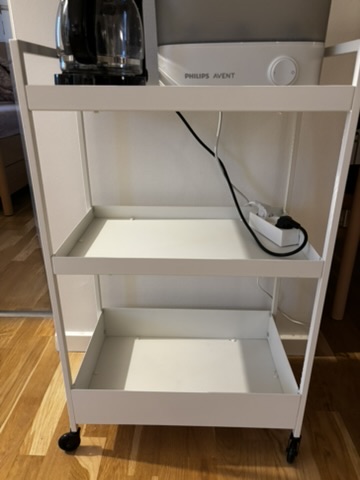 White rolling utility cart